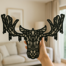 Black MDF keychain hanger with hand-held dimensional geometric deer figure, layered body and multiple hook detail